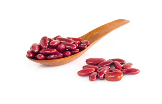 Red kidney beans in wood spoon isolated on white background, healthy food concept