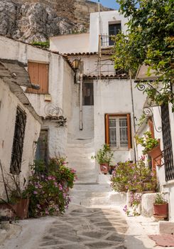 Narrow steps in ancient neighborhood of Anafiotika in Athens by the Acropolis