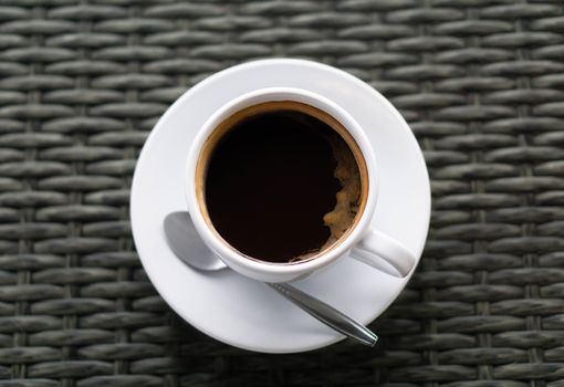 Closeup top view hot americano coffee on wood table 
