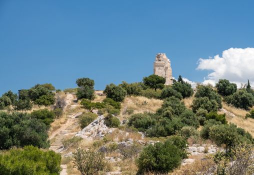 Monument of Filopappos above the trail on the summit of Filopappou Hill