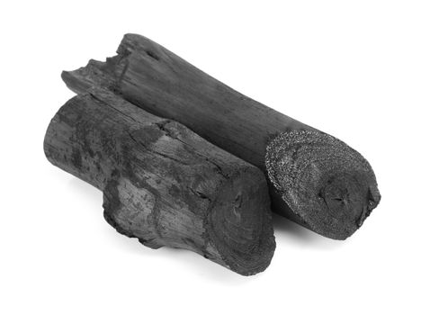 Natural black charcoal isolated on white background