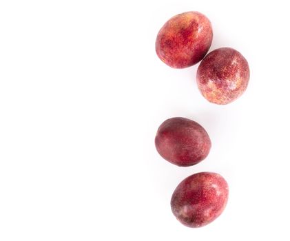 Closeup top view passion fruit on white background, fruit for healthy concept