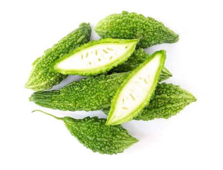 Fresh Bitter gourd isolated on white background, herb and medical concept