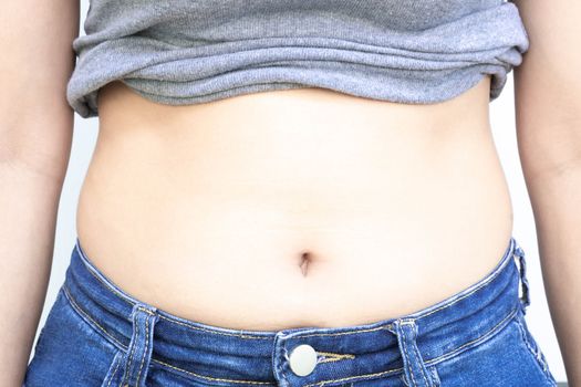 Closeup abdominal surface woman fat, healthy care and beauty concept 