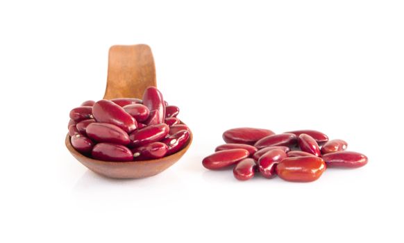 Red kidney beans in wood spoon isolated on white background, healthy food concept