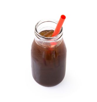 Ice of americano in glass bottle isolated on white background