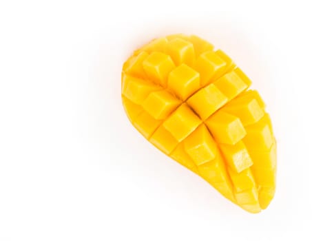 Closeup ripe mango tropical fruit with slice isolated on white background