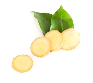 Fresh ginger root sliced on white background for herb and medical product concept
