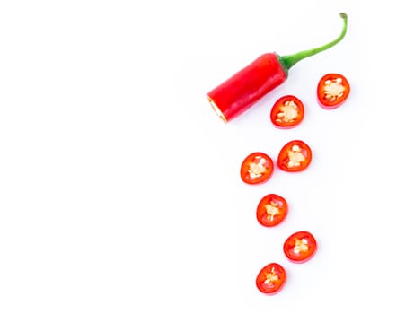 Red chili pepper sliced on white background, raw food ingredient concept