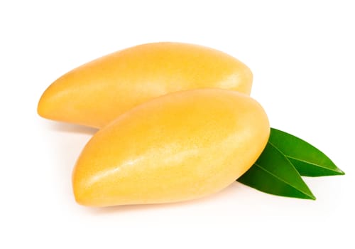 Closeup ripe mango tropical fruit with leaves isolated on white background