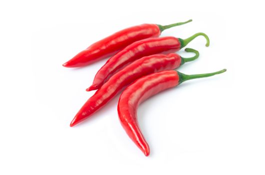 Closeup red chili pepper with sliced on white background, raw food ingredient concept