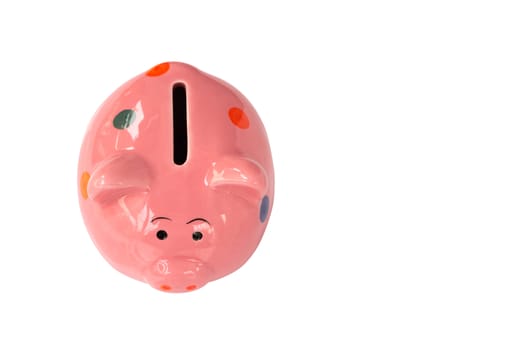 Pink ceramic piggy bank on white background, saving money concept , top view