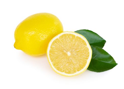 Closeup fresh lemon fruit slice with green leaf on white background, food and healthy concept