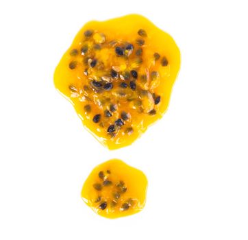 Closeup top view passion fruit seed drop on white background, fruit for healthy concept