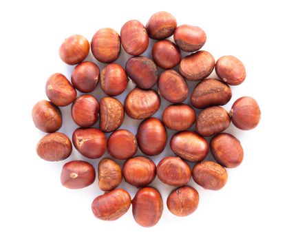 Closeup top view horse chestnuts isolated on white background,  healthy food concept