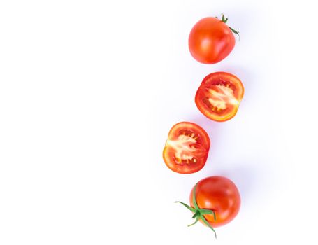 Closeup top view tomato with slice on white background, raw food and vegetable for health