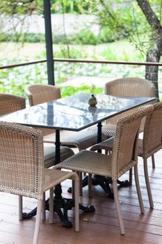 Table and chairs in coffee shop, stock photo