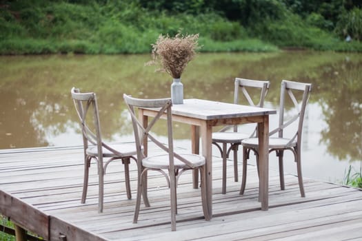 Wooden tables outside coffee shop, stock photo