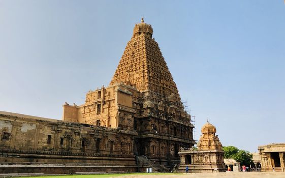 The Brihadisvara temple or Brihadeeswar temple located in Thanjavur, Tamilnadu built by Tamil King Raja Raja Chola-I between 1003 and 1010 AD. This is the Hindu temple built in Dravidian architecture style. The temple is entirely built with granite stones and the temple contains many monolithic sculptures in it. This temple is one of the `Great Living Chola Temples` and also tamil words are inscribed in the wall of the temple. This temple is dedicated to Lord shiva and it is a UNESCO World Heritage Site.