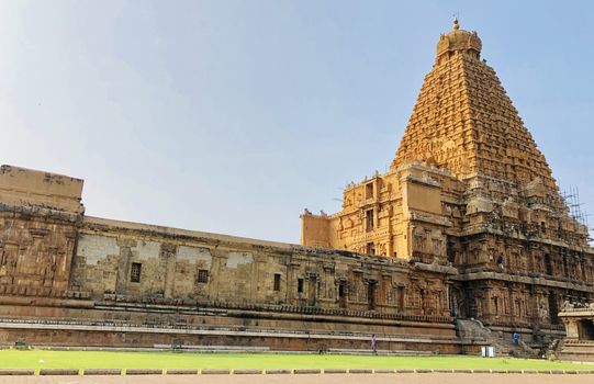 The Brihadisvara temple or Brihadeeswar temple located in Thanjavur, Tamilnadu built by Tamil King Raja Raja Chola-I between 1003 and 1010 AD. This is the Hindu temple built in Dravidian architecture style. The temple is entirely built with granite stones and the temple contains many monolithic sculptures in it. This temple is one of the `Great Living Chola Temples` and also tamil words are inscribed in the wall of the temple. This temple is dedicated to Lord shiva and it is a UNESCO World Heritage Site.
