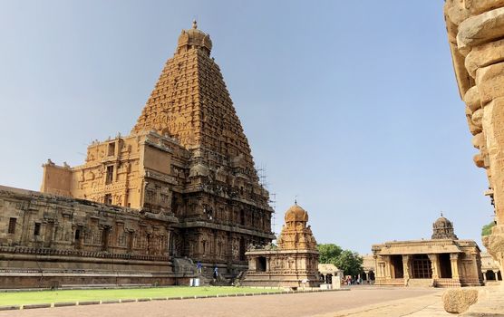 The Brihadisvara temple or Brihadeeswar temple located in Thanjavur, Tamilnadu built by Tamil King Raja Raja Chola-I between 1003 and 1010 AD. This is the Hindu temple built in Dravidian architecture style. The temple is entirely built with granite stones and the temple contains many monolithic sculptures in it. This temple is one of the `Great Living Chola Temples` and also tamil words are inscribed in the wall of the temple. This temple is dedicated to Lord shiva and it is a UNESCO World Heritage Site.