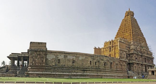 The Brihadisvara temple or Brihadeeswar temple located in Thanjavur, Tamilnadu built by Tamil King Raja Raja Chola-I between 1003 and 1010 AD. This is the Hindu temple built in Dravidian architecture style. The temple is entirely built with granite stones and the temple contains many monolithic sculptures in it. This temple is one of the `Great Living Chola Temples` and also tamil words are inscribed in the wall of the temple. This temple is dedicated to Lord shiva and it is a UNESCO World Heritage Site.