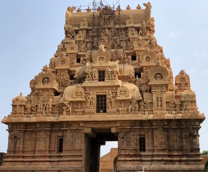 The Brihadisvara temple or Brihadeeswar temple located in Thanjavur, Tamilnadu built by Tamil King Raja Raja Chola-I between 1003 and 1010 AD. This is the Hindu temple built in Dravidian architecture style. The temple is entirely built with granite stones and the temple contains many monolithic sculptures in it. This temple is one of the `Great Living Chola Temples` and also tamil words are inscribed in the wall of the temple. This temple is dedicated to Lord shiva and it is a UNESCO World Heritage Site.