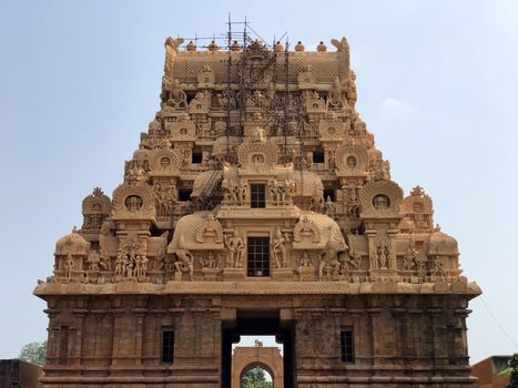 The Brihadisvara temple or Brihadeeswar temple located in Thanjavur, Tamilnadu built by Tamil King Raja Raja Chola-I between 1003 and 1010 AD. This is the Hindu temple built in Dravidian architecture style. The temple is entirely built with granite stones and the temple contains many monolithic sculptures in it. This temple is one of the `Great Living Chola Temples` and also tamil words are inscribed in the wall of the temple. This temple is dedicated to Lord shiva and it is a UNESCO World Heritage Site.