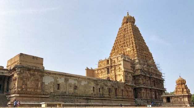 The Brihadisvara temple or Brihadeeswar temple located in Thanjavur, Tamilnadu built by Tamil King Raja Raja Chola-I between 1003 and 1010 AD. This is the Hindu temple built in Dravidian architecture style. The temple is entirely built with granite stones and the temple contains many monolithic sculptures in it. This temple is one of the `Great Living Chola Temples` and also tamil words are inscribed in the wall of the temple. This temple is dedicated to Lord shiva and it is a UNESCO World Heritage Site.