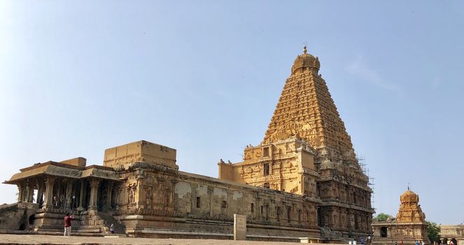 The Brihadisvara temple or Brihadeeswar temple located in Thanjavur, Tamilnadu built by Tamil King Raja Raja Chola-I between 1003 and 1010 AD. This is the Hindu temple built in Dravidian architecture style. The temple is entirely built with granite stones and the temple contains many monolithic sculptures in it. This temple is one of the `Great Living Chola Temples` and also tamil words are inscribed in the wall of the temple. This temple is dedicated to Lord shiva and it is a UNESCO World Heritage Site.