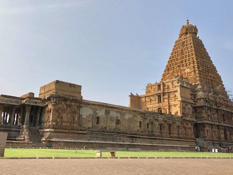 The Brihadisvara temple or Brihadeeswar temple located in Thanjavur, Tamilnadu built by Tamil King Raja Raja Chola-I between 1003 and 1010 AD. This is the Hindu temple built in Dravidian architecture style. The temple is entirely built with granite stones and the temple contains many monolithic sculptures in it. This temple is one of the `Great Living Chola Temples` and also tamil words are inscribed in the wall of the temple. This temple is dedicated to Lord shiva and it is a UNESCO World Heritage Site.
