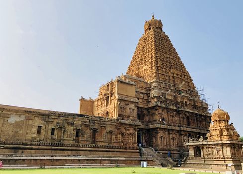The Brihadisvara temple or Brihadeeswar temple located in Thanjavur, Tamilnadu built by Tamil King Raja Raja Chola-I between 1003 and 1010 AD. This is the Hindu temple built in Dravidian architecture style. The temple is entirely built with granite stones and the temple contains many monolithic sculptures in it. This temple is one of the `Great Living Chola Temples` and also tamil words are inscribed in the wall of the temple. This temple is dedicated to Lord shiva and it is a UNESCO World Heritage Site.