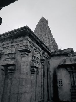 The Brihadisvara temple or Brihadeeswar temple located in Thanjavur, Tamilnadu built by Tamil King Raja Raja Chola-I between 1003 and 1010 AD. This is the Hindu temple built in Dravidian architecture style. The temple is entirely built with granite stones and the temple contains many monolithic sculptures in it. This temple is one of the `Great Living Chola Temples` and also tamil words are inscribed in the wall of the temple. This temple is dedicated to Lord shiva and it is a UNESCO World Heritage Site.