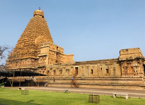 The Brihadisvara temple or Brihadeeswar temple located in Thanjavur, Tamilnadu built by Tamil King Raja Raja Chola-I between 1003 and 1010 AD. This is the Hindu temple built in Dravidian architecture style. The temple is entirely built with granite stones and the temple contains many monolithic sculptures in it. This temple is one of the `Great Living Chola Temples` and also tamil words are inscribed in the wall of the temple. This temple is dedicated to Lord shiva and it is a UNESCO World Heritage Site.