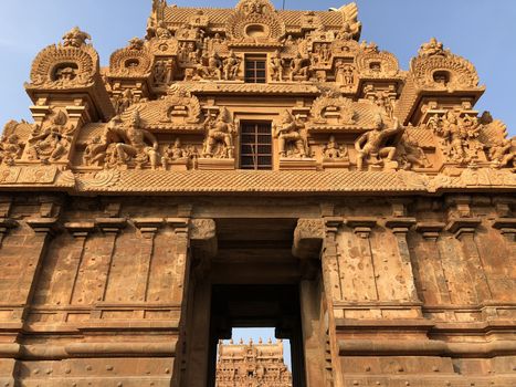 The Brihadisvara temple or Brihadeeswar temple located in Thanjavur, Tamilnadu built by Tamil King Raja Raja Chola-I between 1003 and 1010 AD. This is the Hindu temple built in Dravidian architecture style. The temple is entirely built with granite stones and the temple contains many monolithic sculptures in it. This temple is one of the `Great Living Chola Temples` and also tamil words are inscribed in the wall of the temple. This temple is dedicated to Lord shiva and it is a UNESCO World Heritage Site.