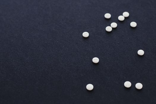 Pills and medical drugs, medicine and supplement for pharmaceutical industry and health care concept