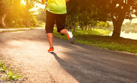 A man running at the morning for jogging and exercise.