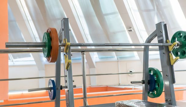 sports equipment and barbells in the gym