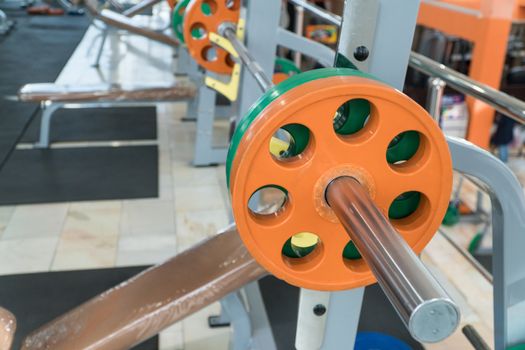 sports equipment and barbells in the gym