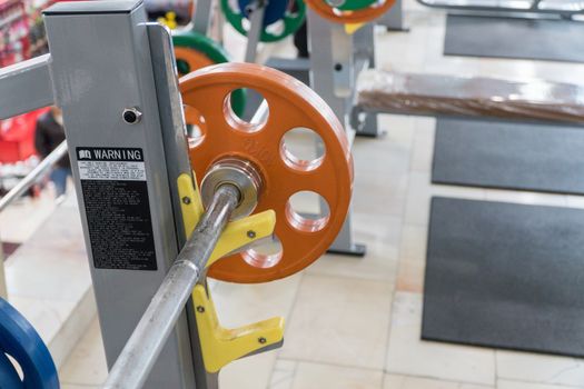 sports equipment and barbells in the gym, close-up
