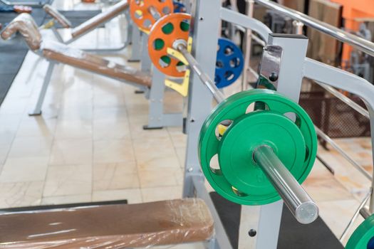 sports equipment and barbells in the gym