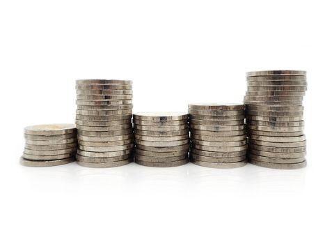 Saving money concept with money coin stack isolated on white background. Financial and accounting concept.