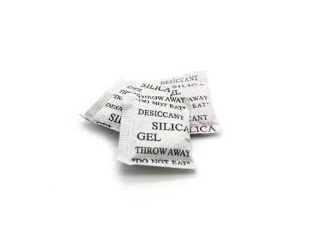 Silica gel packets isolated on a white background.