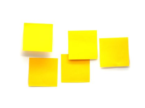 Orange paper stick note isolated on a white background.