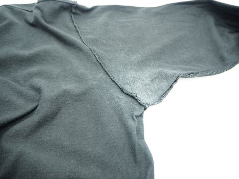 White stain under armpit on T-shirt isolated on white background. 