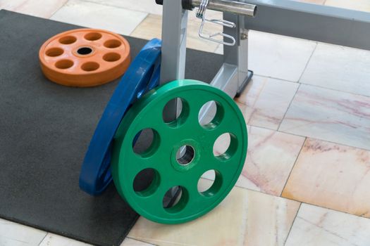 sports equipment and barbells in the gym, close-up