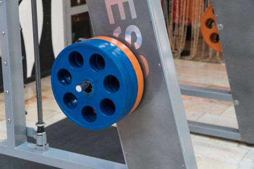 sports equipment and barbells in the gym, close-up