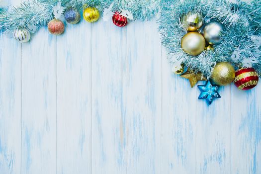 Christmas and new year accessory with copy space on blue wooden background.