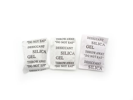 Silica gel packets isolated on a white background.