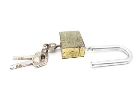 Keys stuck in a old lock isolated on a white background.